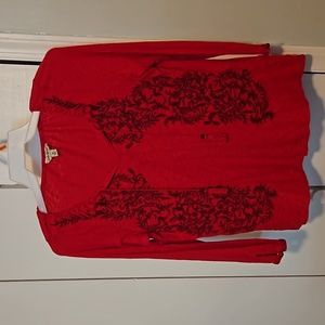 Red shirt with tassles